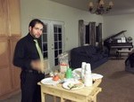 Getting ready to prepare food for everyone during an evening worship